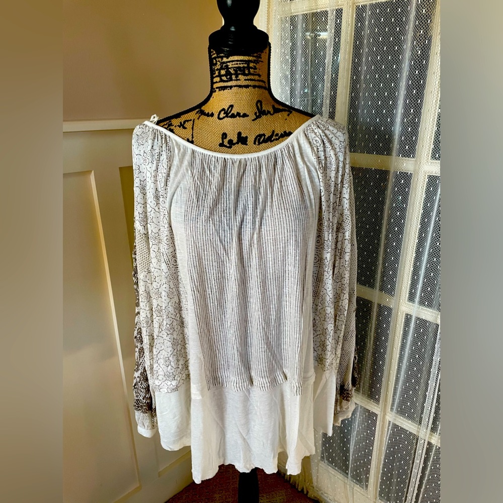 Free People top. Runs big.
